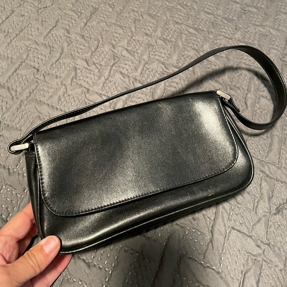 Small clutch size purse with strap